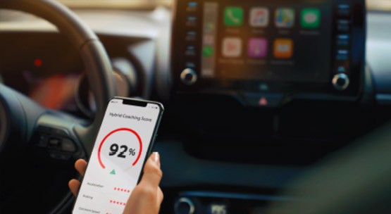 Person using MyT app in their car